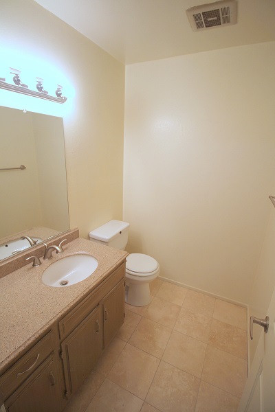 Remodeled bathroo with granite, marble and refinished cabinets