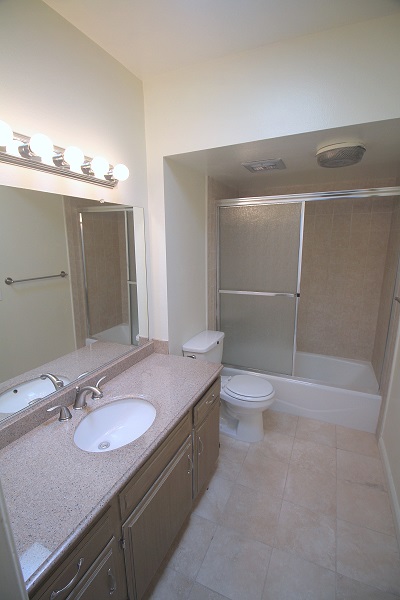 Remodeled Large bathrrom with two vanities and shower/tub